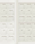 Wonderland222 A6 2027 Weekly Planner Core Stacked Weekends