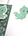 Close-up of a green ghost washi sticker beside the sheet