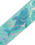 Close-up of Ocean Wave Clear Tape showing a manta ray and holographic foil details